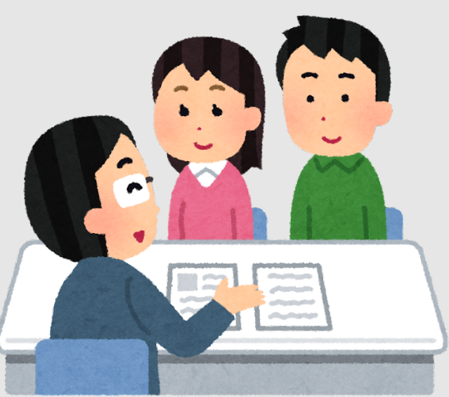 談笑する営業マンと不動産購入者